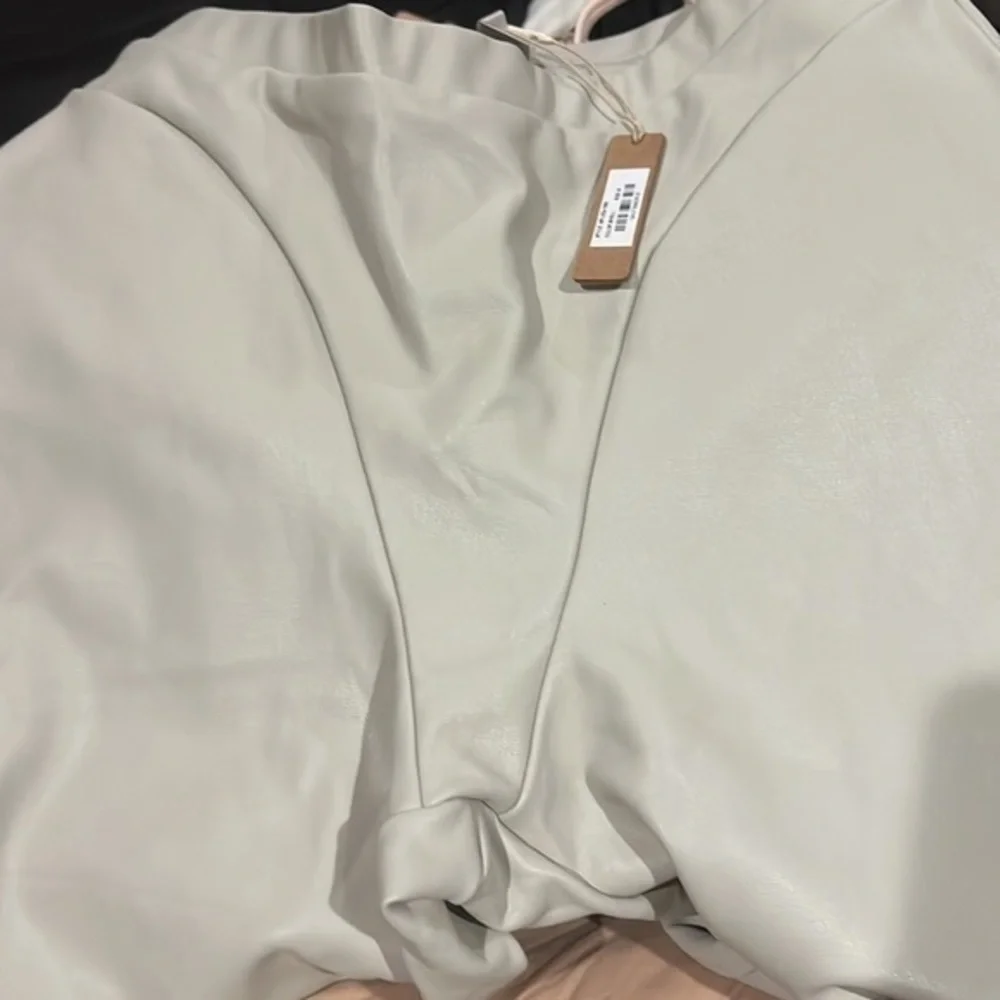 Skims Faux Leather Boot Cut Pants - Picture 3 of 4